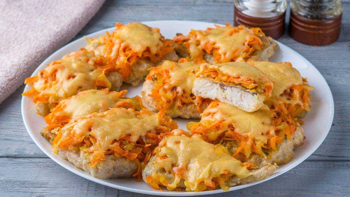 Вкусный хек в духовке с овощами