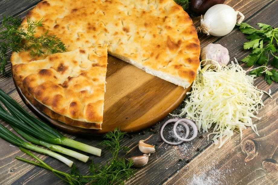 Пышный пирог с капустой на дрожжах с вареным яйцом Готовим в духовке открытый и закрытый вариант выпечки Пошаговый подробный рецепт с авторскими фото